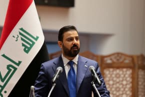 Iraqi Prime Minister-designate Ali al-Zaidi speaks during a parliamentary session to vote in a new government headed by Ali al-Zaidi as prime minister, at the parliament headquarters in Baghdad, Iraq, May 14, 2026.