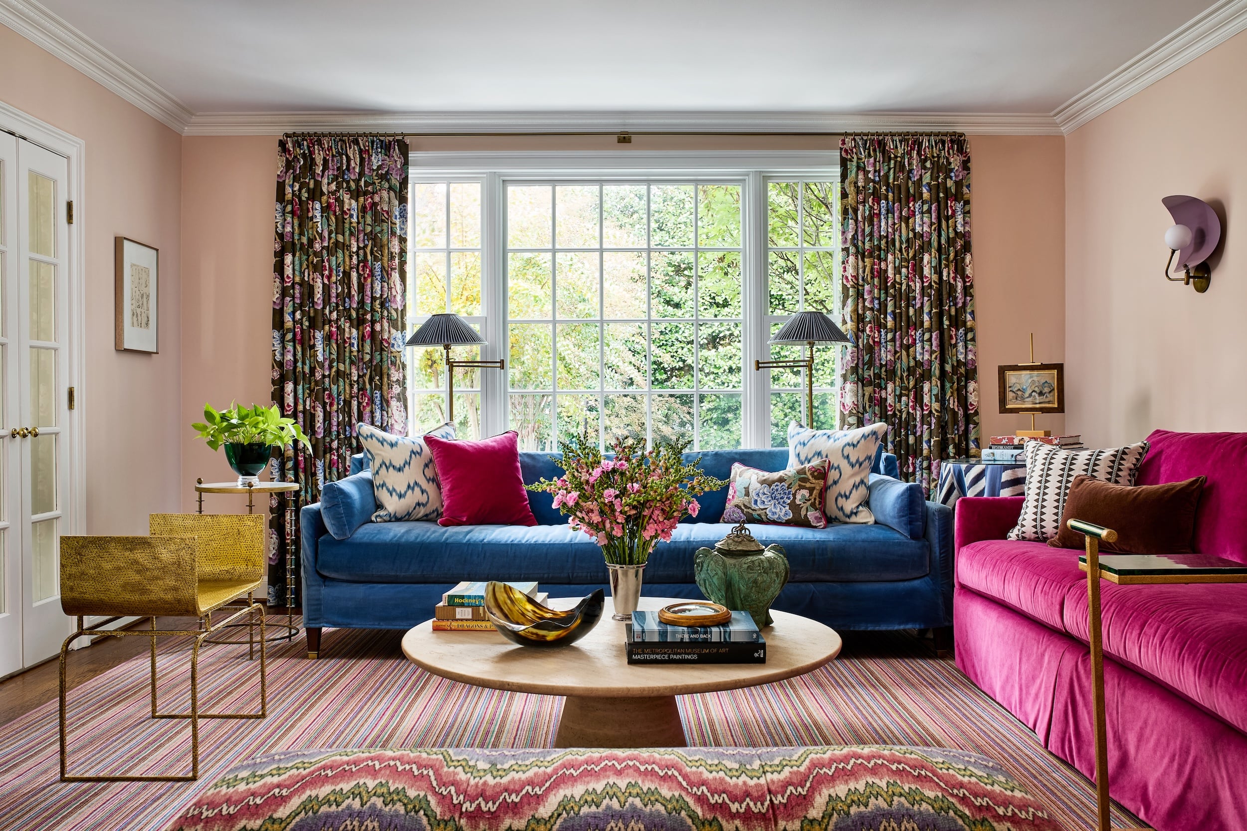 The living room design blends Vibrant colors and pattern play.