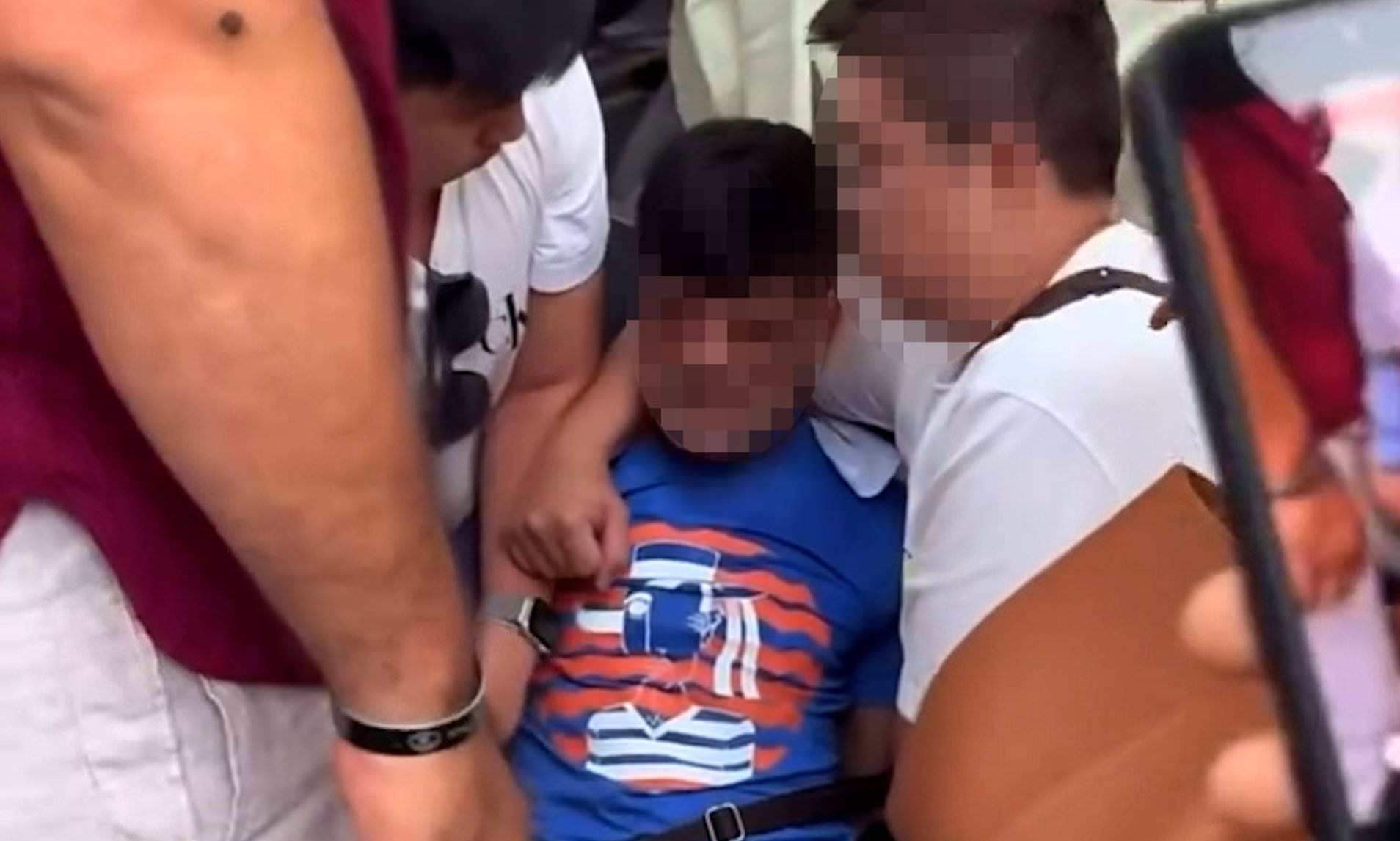 Moment 'pickpocket' is caught and pinned down by furious tourists