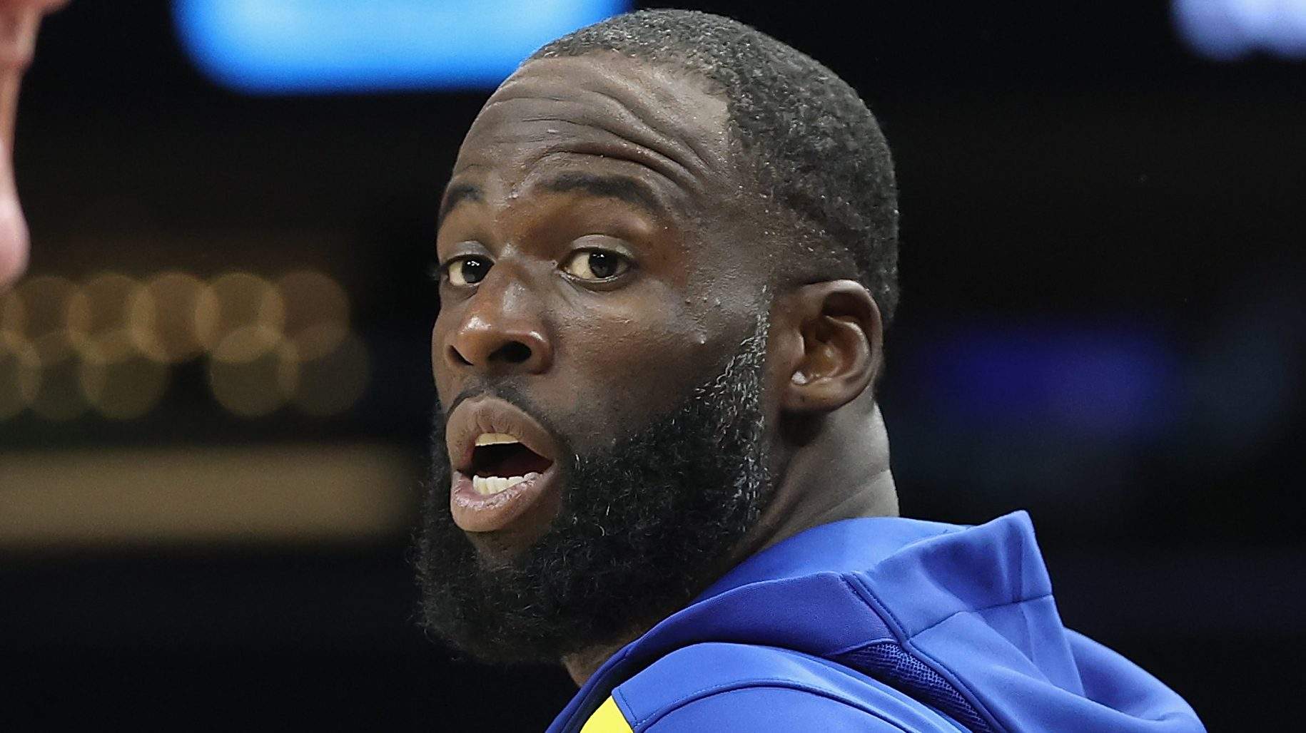 Draymond Green #23 (R) of the Golden State Warriors