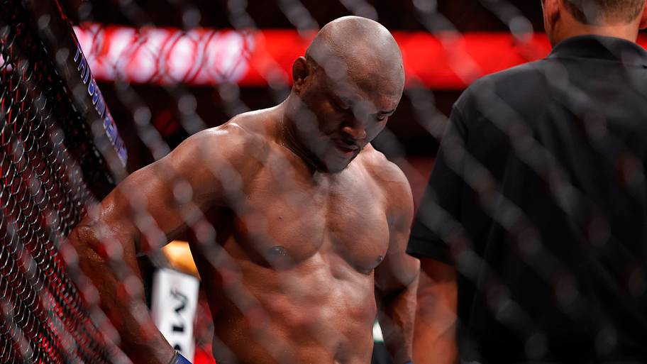 Kamaru Usman (blue gloves) reacts after the fight against Dricus Du Plessis (red gloves) during UFC Fight Night at Paycom Cen