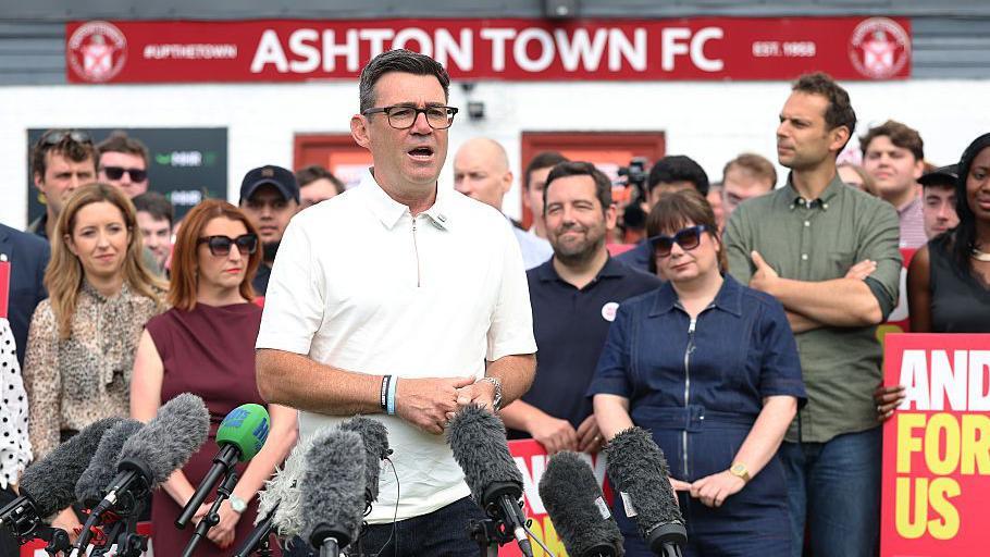 Andy Burnham gave a nod to his love of sport by giving his parliamentary victory speech outside Edge Green Street, the home ground of Ashton Town