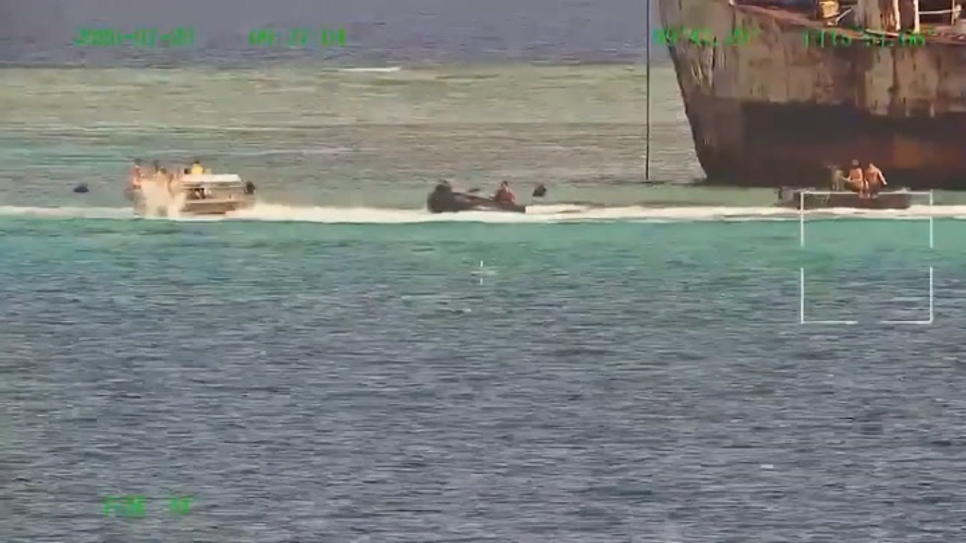 Naval crews beat each other with oars as Philippine and Chinese vessels ...