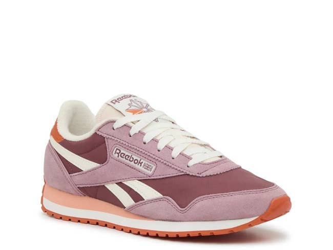 A classic Reebok sneaker with a vintage design, featuring a mix of suede and fabric materials with a contrasting sole