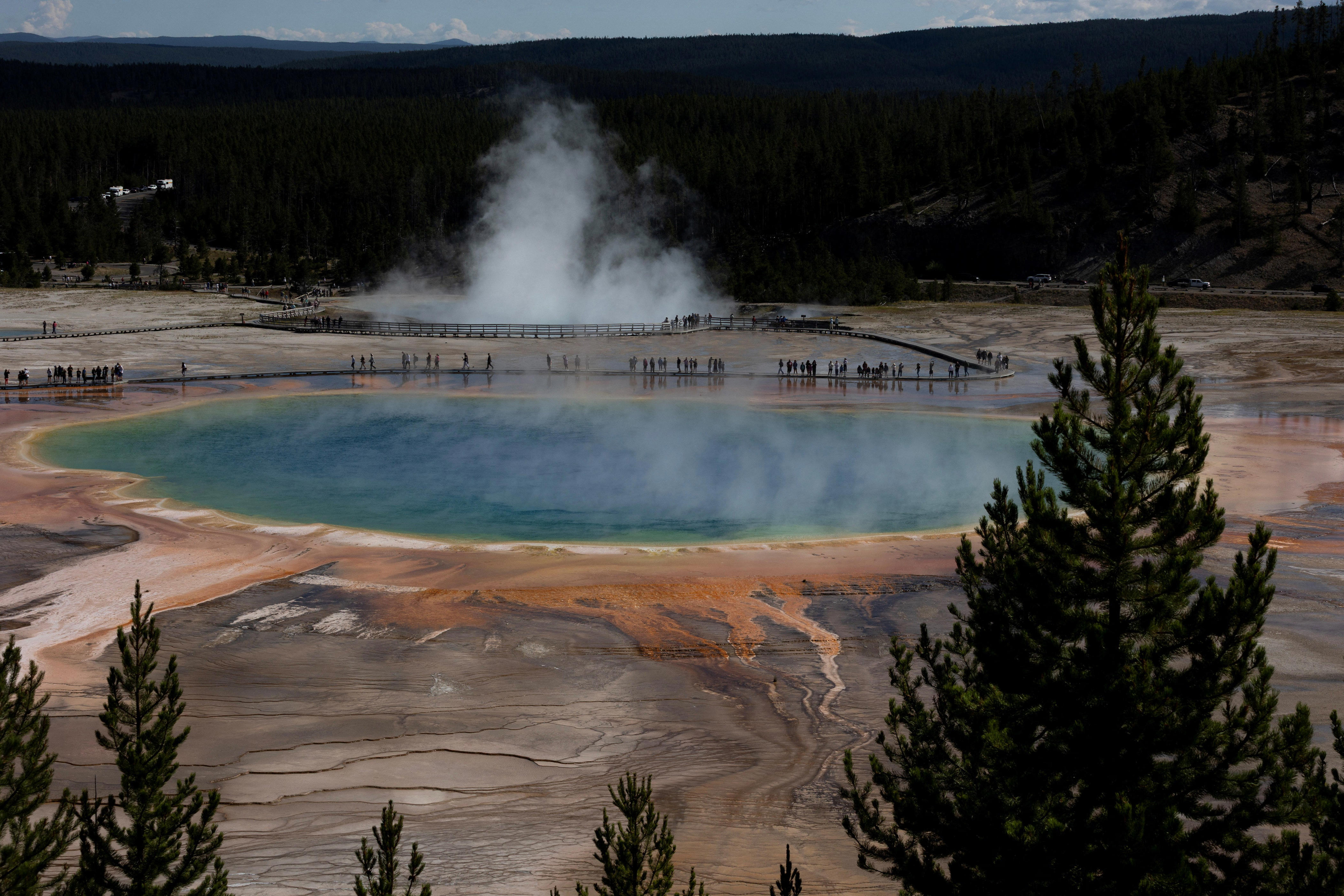 Tourists caught walking on Yellowstone hot spring's deadly crust