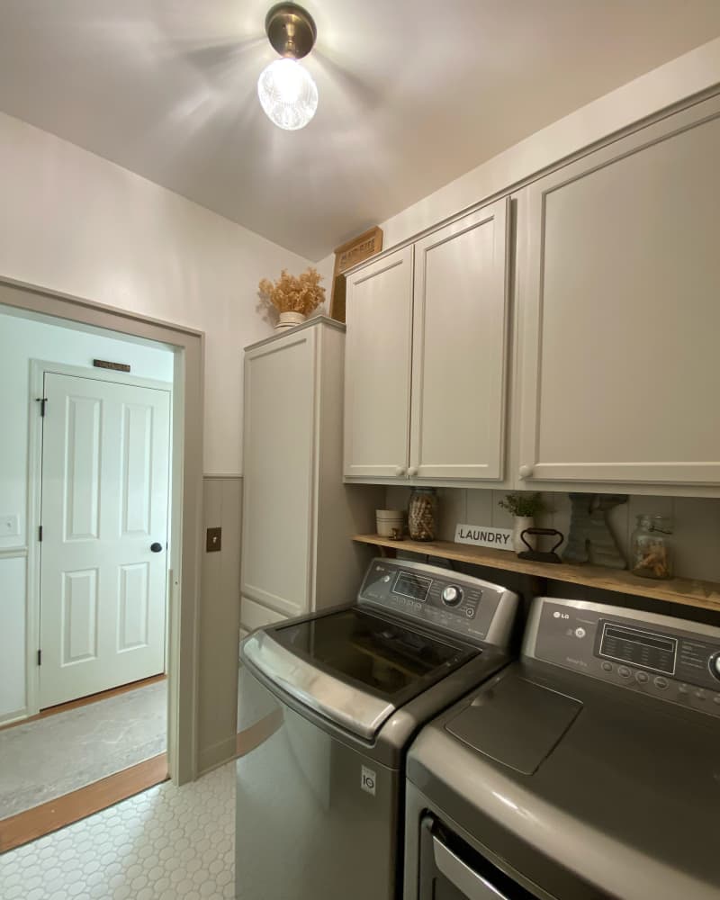 Mounted light in newly remodeled laundry room.