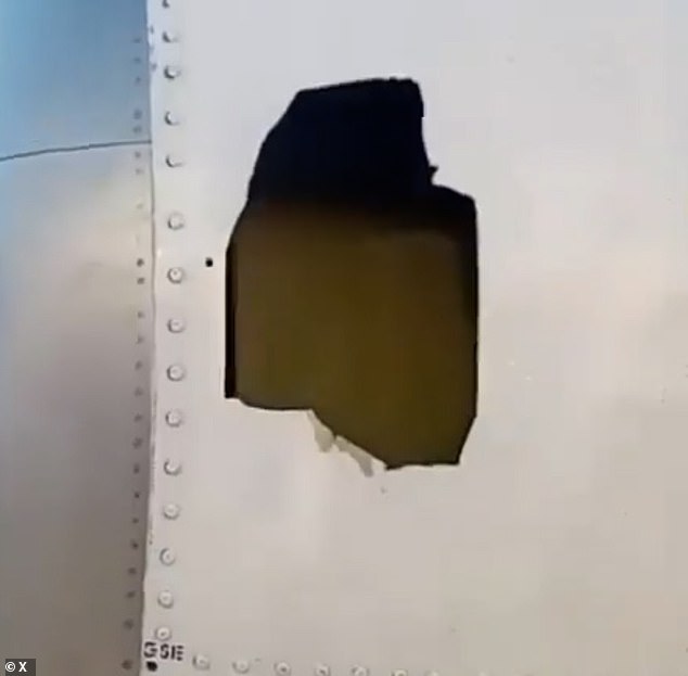 A large hole can be seen in the side of the engine casing. Travellers feared they 'wouldn't make it' as the jet flew for around 30 minutes with the damaged window