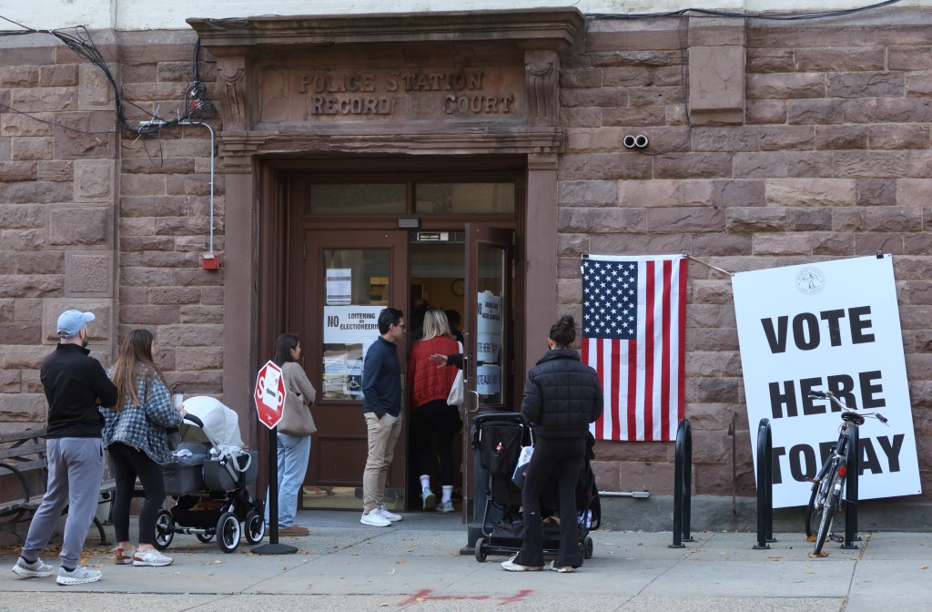 people-stand-line-vote-early-135104737
