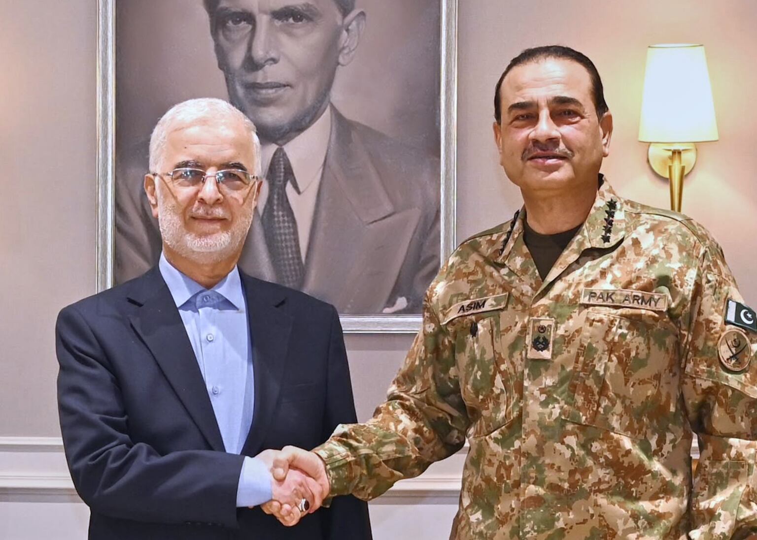 Iran’s interior minister Eskandar Momeni, left, meets Pakistan’s Army Chief Field Marshal Asim Munir (Inter Services Public Relations/AP)