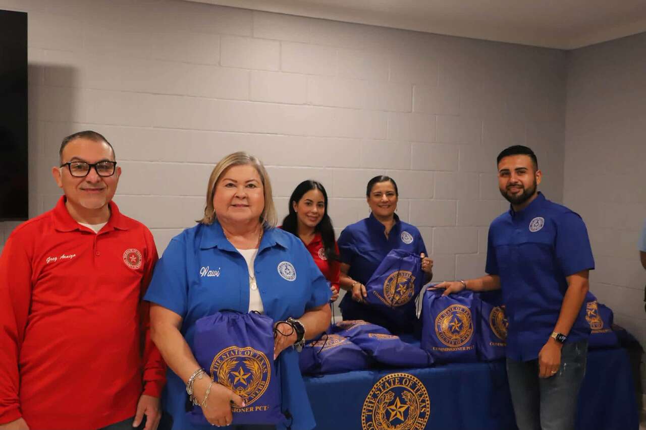 Precinct 2 students receive backpacks and school supplies