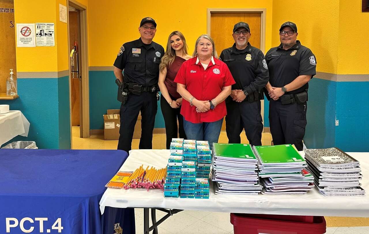 Precinct 2 students receive backpacks and school supplies