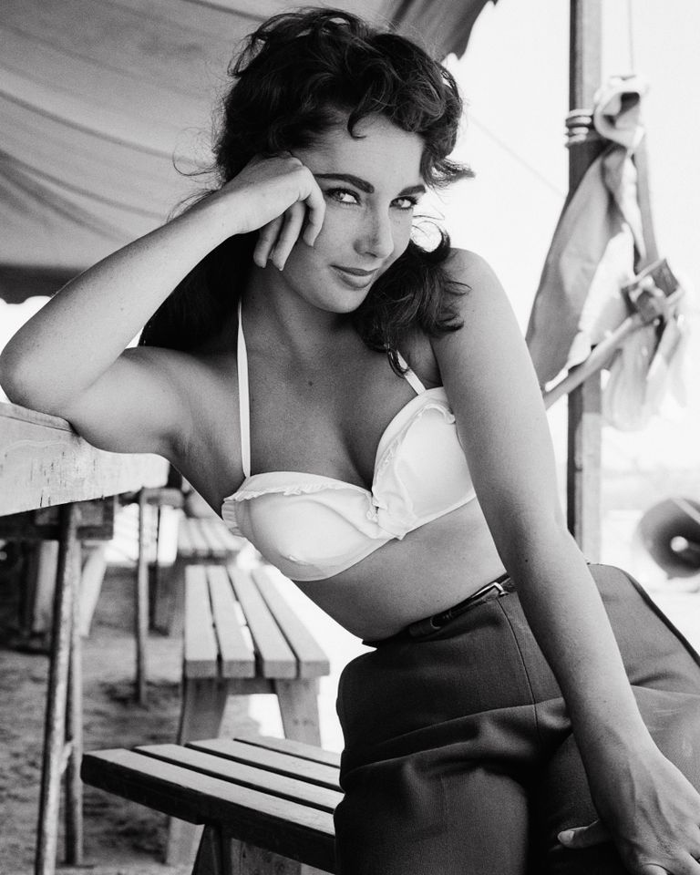 Elizabeth Taylor posed outdoors while behind the scenes of the film