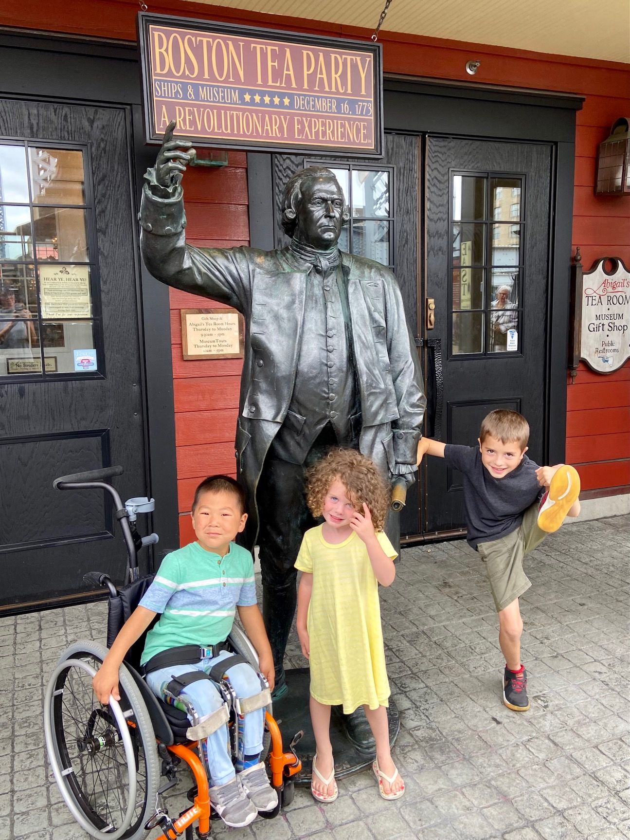 Jaden, Nella, and Wesley outside the Boston Tea Party Ships & Museum