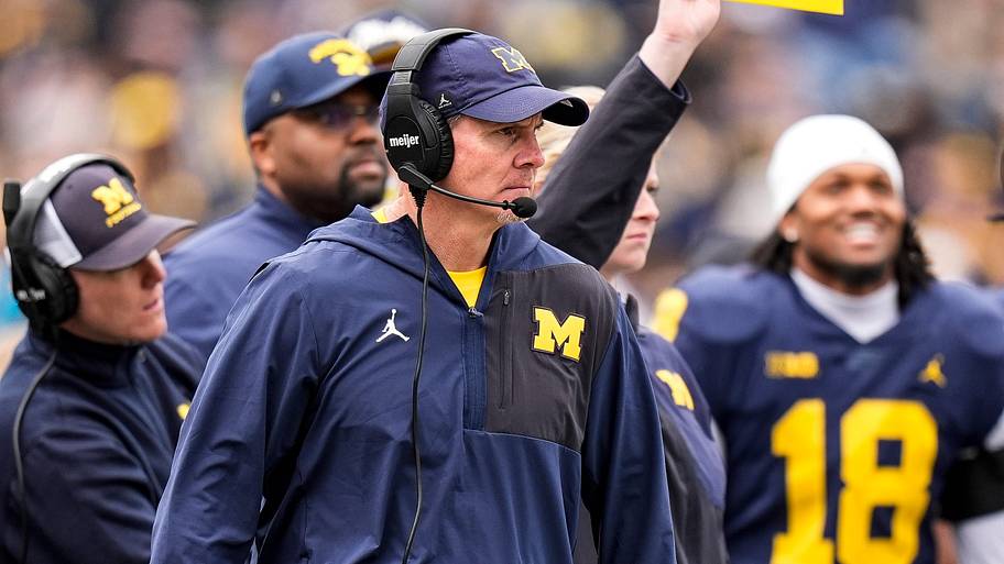 Michigan defensive coordinator Jay Hill watches a play