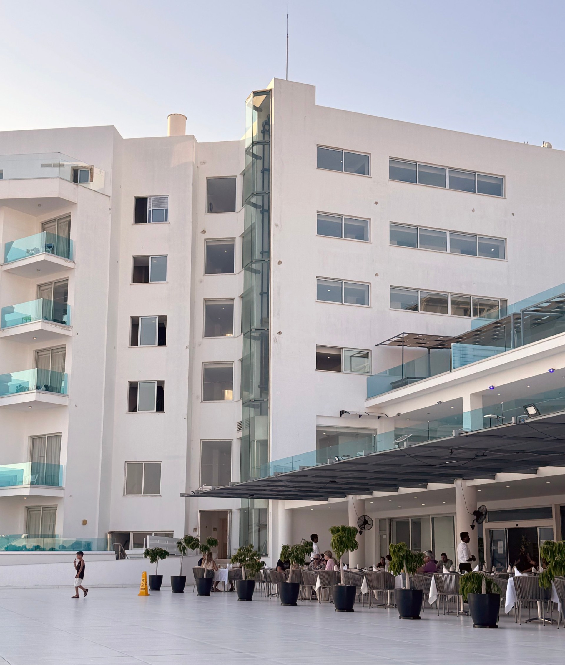 The 4th floor window (second floor down on right hand building, closest to glass lift) where a British two year old tragically fell to his death while waiting for the adjacent lift, in the care of his father, at the beginning of their 2 week holiday at the King Evelthon Beach Hotel and Resort in Cyprus. At the time of the Mail???s visit at least one of the two other lifts were out of action, and the lift seen here, a glass elevator with views of the beach, was frequently delayed. See Eirian Prosser Story.