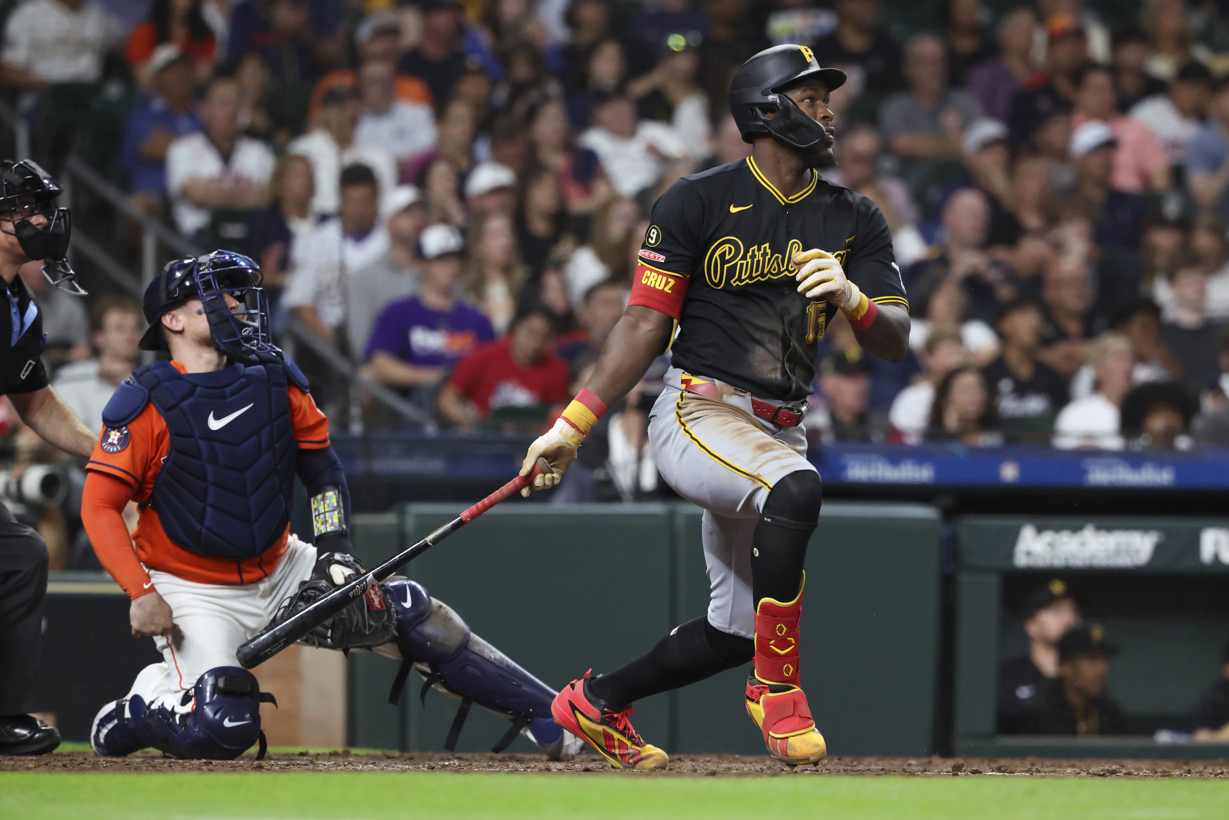 Jun 3, 2026; Houston, Texas, USA; Pittsburgh Pirates center fielder Oneil Cruz (15) hits a single during the fourth inning against the Houston Astros at Daikin Park. Mandatory Credit: Troy Taormina-Imagn Images