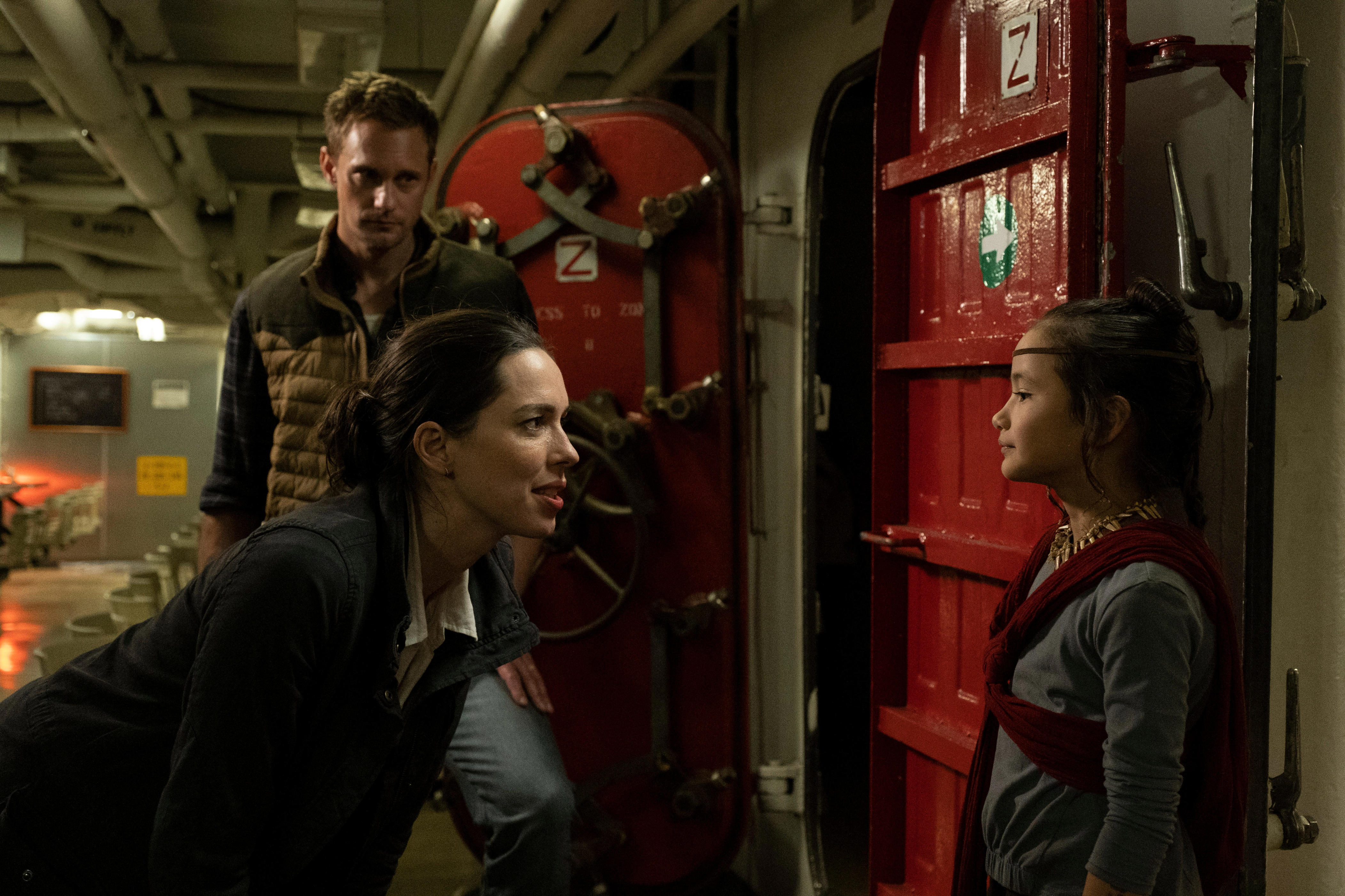 Alexander Skarsgård, Rebecca Hall and Kaylee Hottle in "Godzilla vs. Kong."