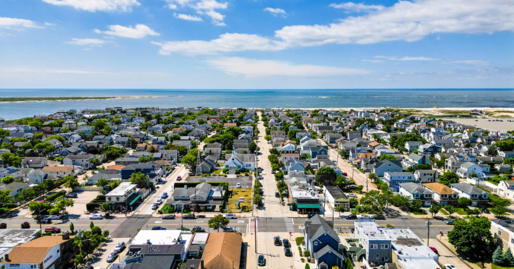 An overhead view of the residential area near Jones Beach on Long Island, with the ocean in the background.