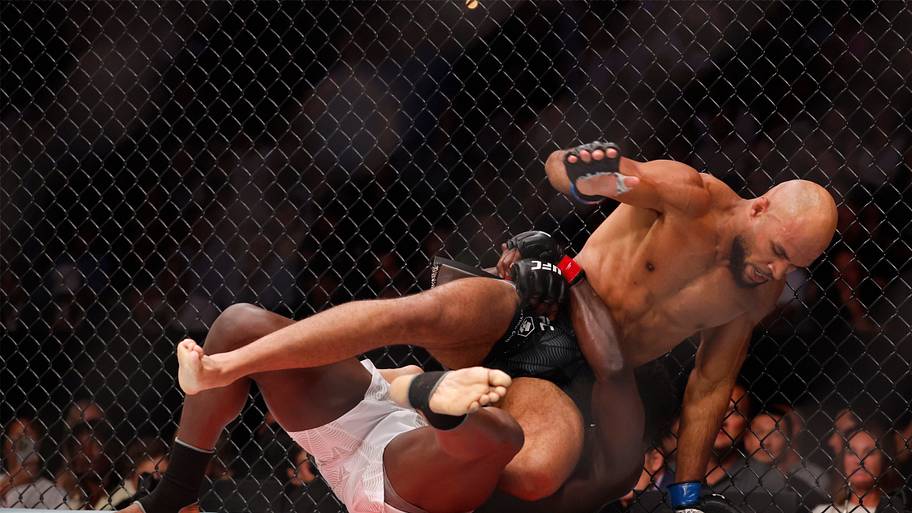 Jared Cannonier (red gloves) fights Christian Leroy Duncan (blue gloves) during UFC Fight Night at Paycom Center.