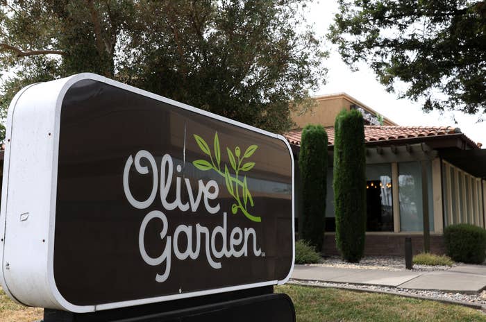 Olive Garden restaurant exterior with a sign displaying the name and an olive branch logo