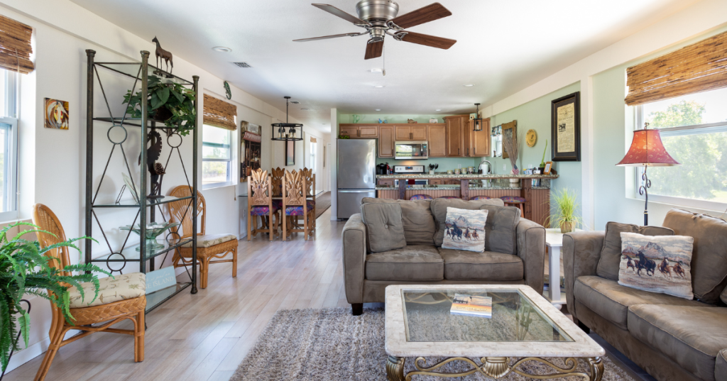 The interior of Moonshine Acres Airbnb, complete with a full kitchen, couches, and multiple places to relax.
