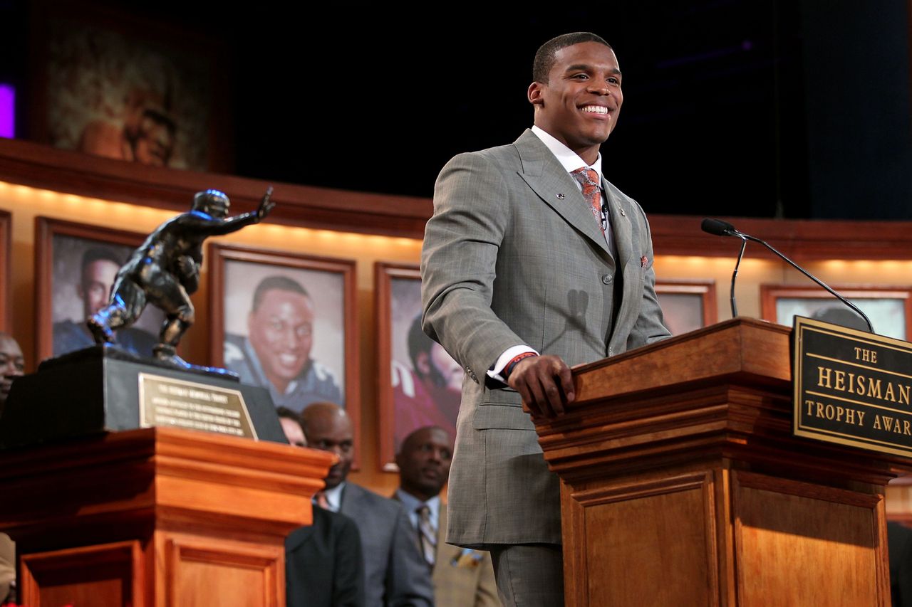 Quarterback Cam Newton of the Auburn University Tigers speaks after being named the 76th Heisman Memorial Trophy Award winner at the Best Buy Theater on December 11, 2010 in New York City