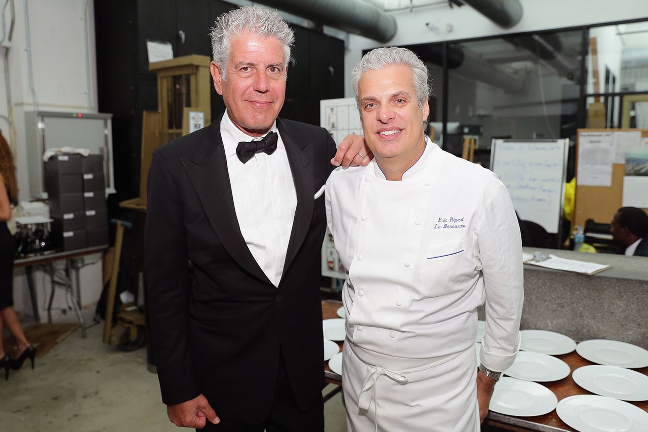 Chefs Anthony Bourdain (L) and Eric Ripert attend Ocean Liner dinner hosted by Anthony Bourdain, Frederic Morin, David McMillan, Andrew Carmellini, Eric Ripert, Daniel Boulud and Francois Payard during the Food Network South Beach Wine & Food Festival at Wolfsonian on February 21, 2014