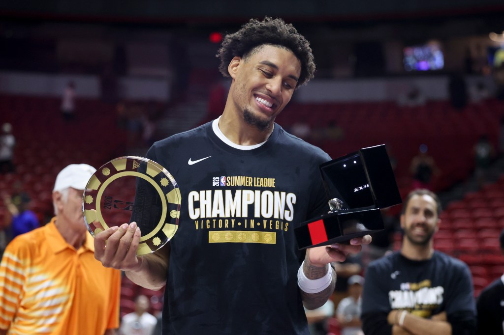 Yaxel Lendeborg #1 of the Golden State Warriors holds up the 026 NBA Las Vegas Summer League MVP trophy and championship ring after his team's victory over the Memphis Grizzlies in the 2026 NBA Summer League championship game at the Thomas & Mack Center on July 19, 2026 in Las Vegas, Nevada. The Warriors defeated the Grizzlies 94-90.