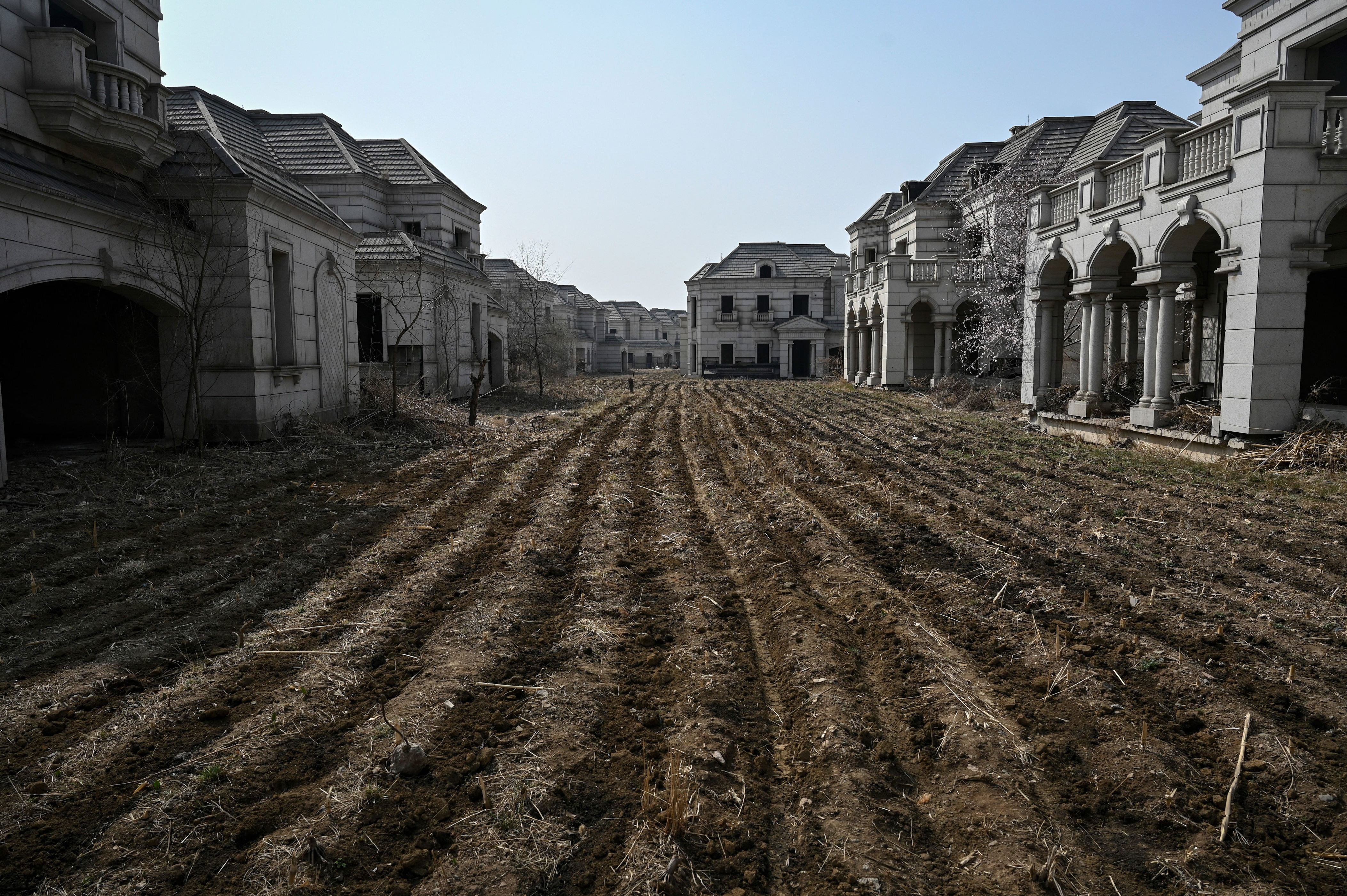 The plowed fields of the development were originally expected to be the verdant gardens of the homeowners.