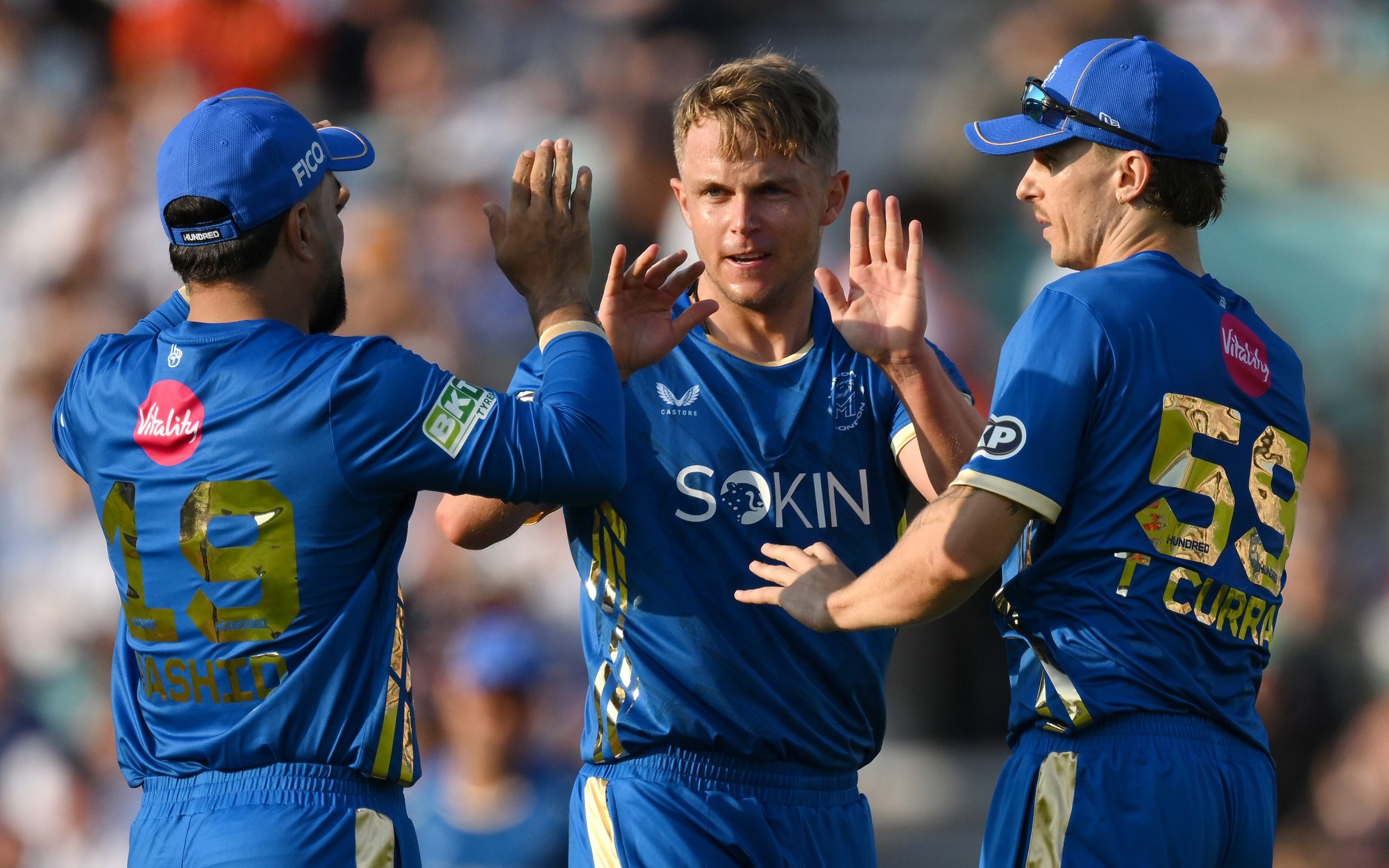 Sam Curran (centre) and his team-mates debut the MI London kit in the 2026 Hundred's curtain-raiser at the Oval