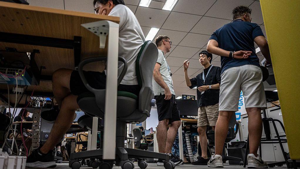 Tokyo urges men to wear shorts to work, but women say it's 'leg hair harassment'