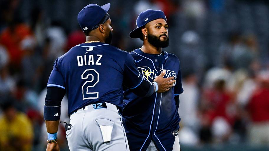 Tampa Bay Rays first baseman Yandy Diaz (2) and third baseman Junior Caminero.