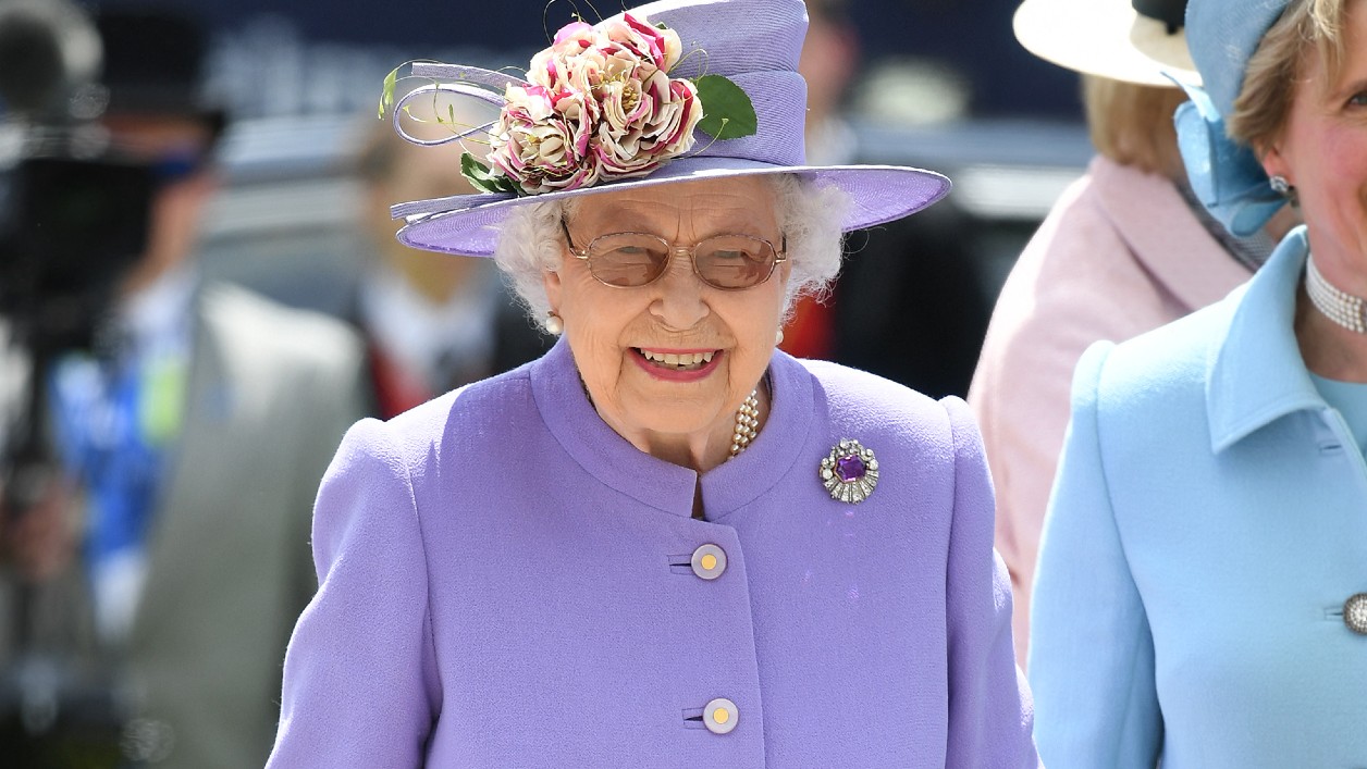 Queen Elizabeth shed light on the bond between Prince George and Princess Charlotte, saying it was Charlotte who ‘looked after’ her older brother
