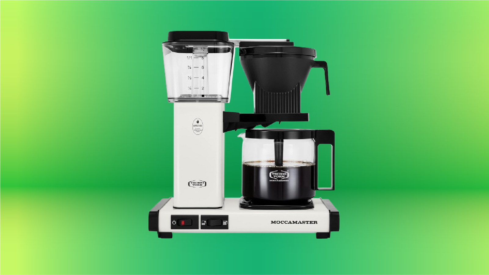 Technivorm's Moccamaster in white on display against a green gradient background.