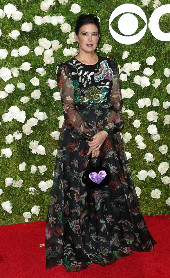 Phoebe Cates Kline on the red carpet at an event posing in a dress