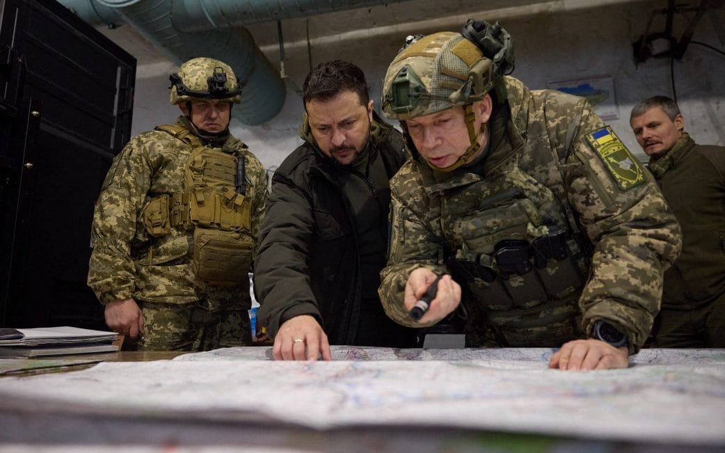 Volodymyr Zelensky, centre, with Oleksandr Syrsky, right, at an army command post in Kupiansk, 2023