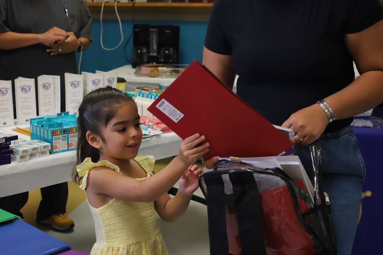 Precinct 2 students receive backpacks and school supplies