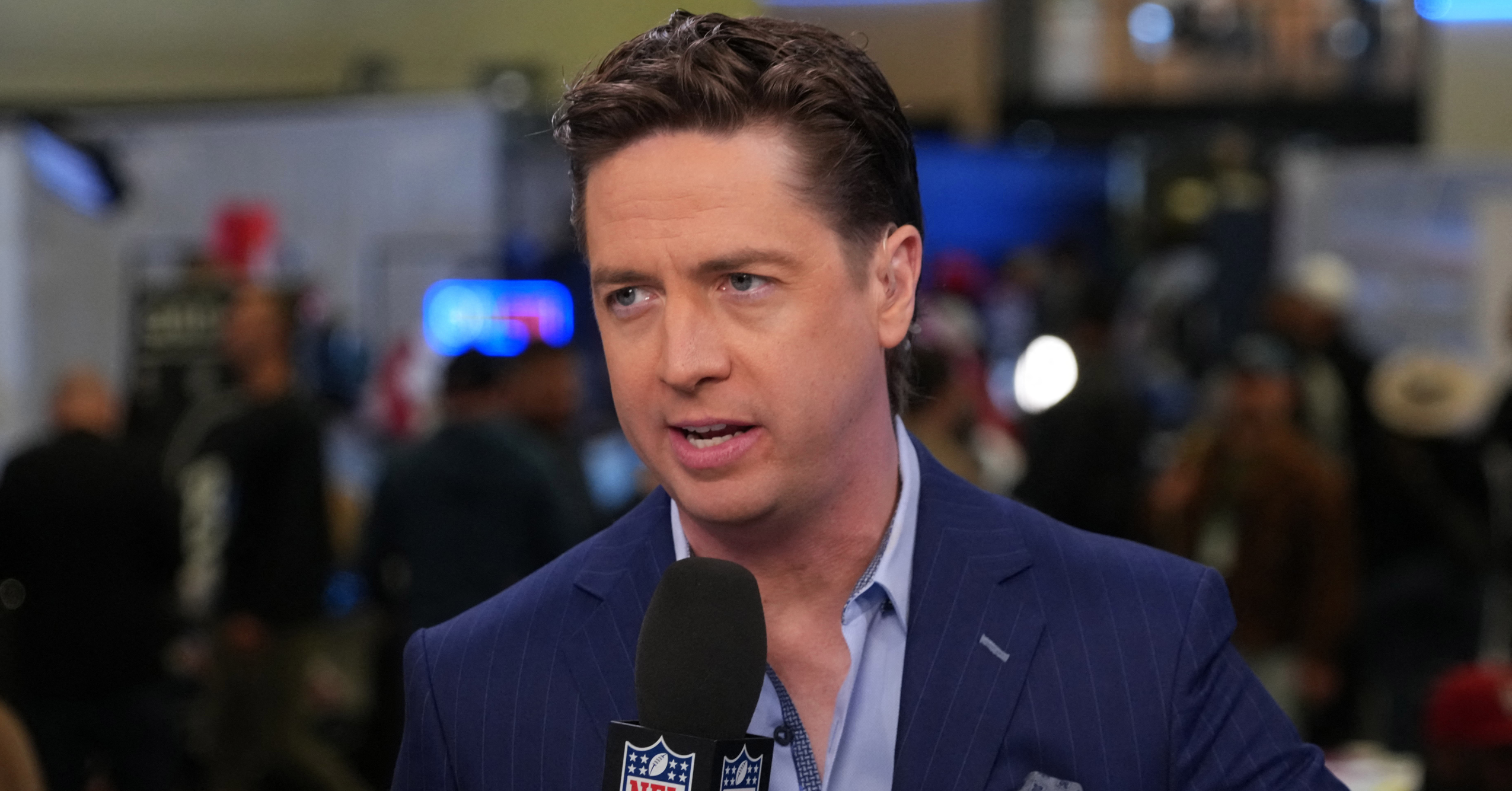 ESPN fires insider with year left on deal