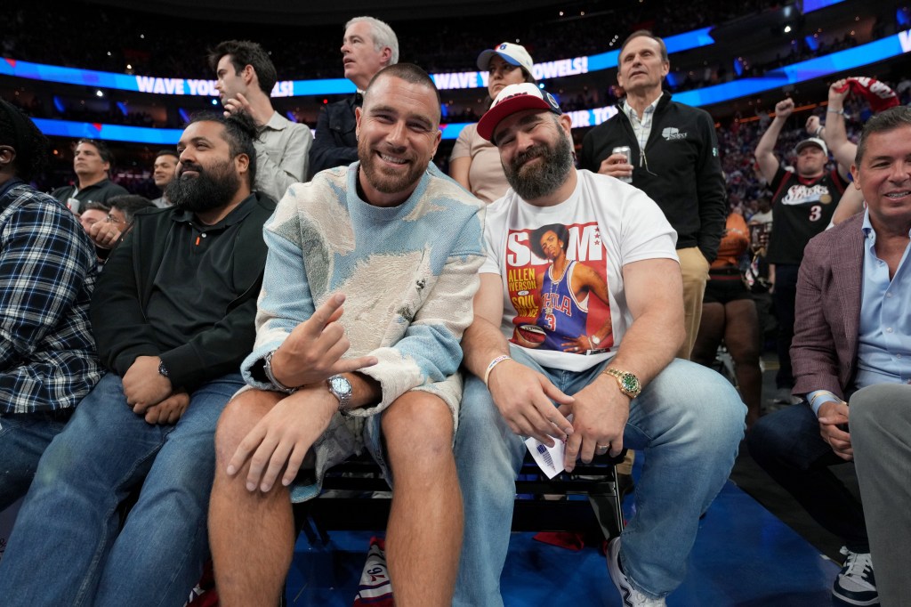 Travis and Jason Kelce attending a basketball game.