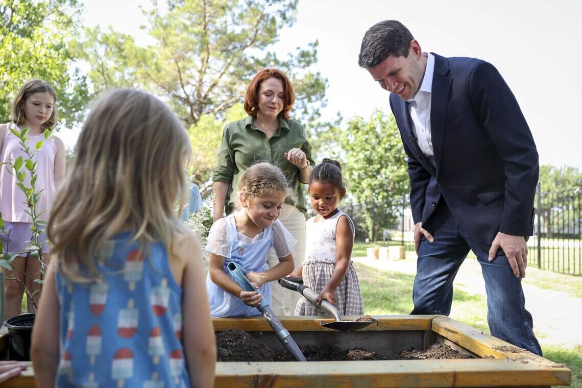 Democratic U.S. Senate nominee James Talarico helps preschoolers Catalina Cortes and Amelia Abeyta, both 4 years old, garden at Green Space Nature Preschool on Tuesday, July 21, 2026, in Fort Worth. Talarico, a state representative from the Austin area, was a sponsor of Proposition 2, which allows local governments to provide property tax relief to eligible childcare providers, and was approved in a voter referendum in 2023.