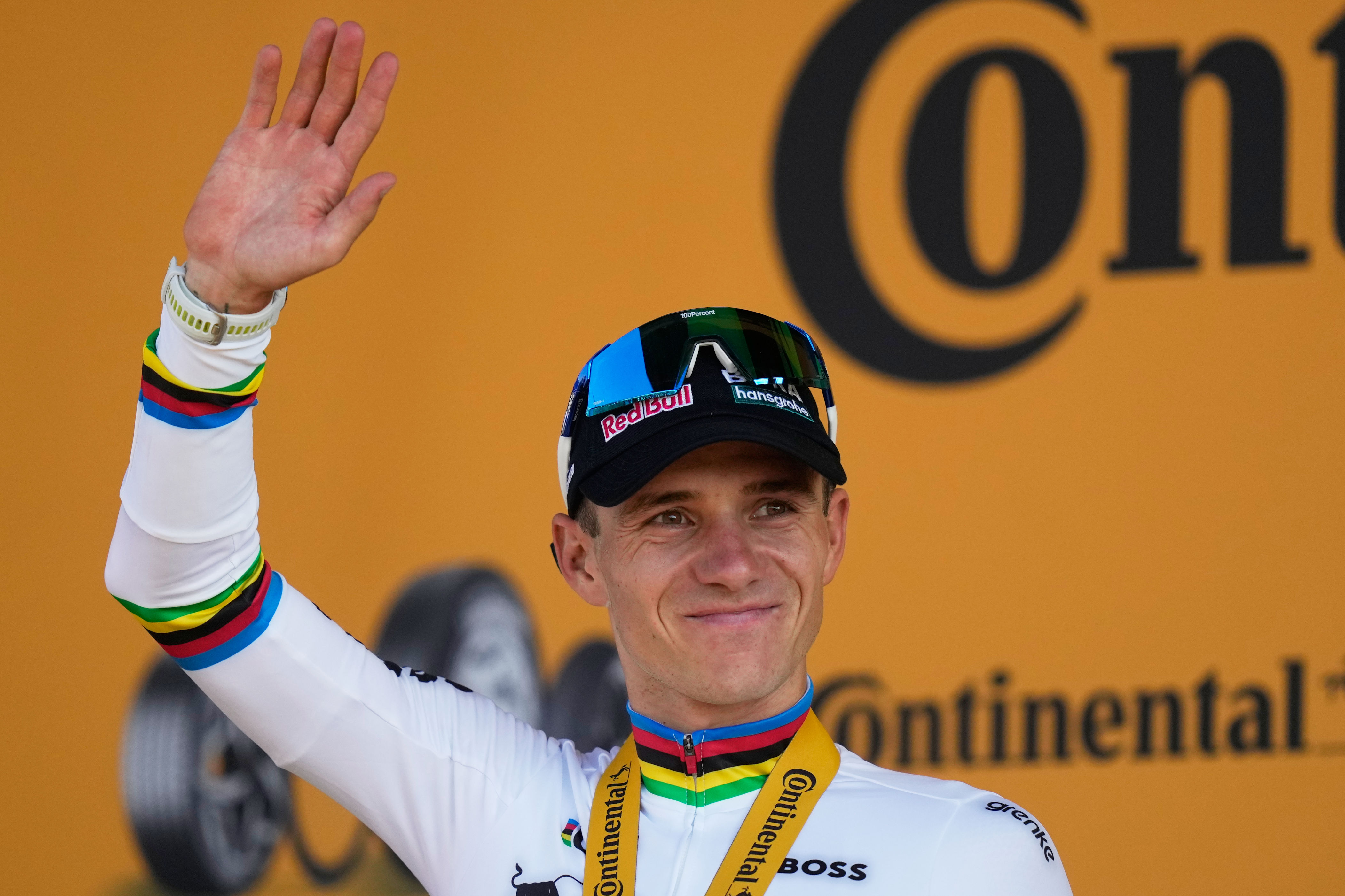 Belgium's Remco Evenepoel arrives on the podium after winning the sixteenth stage of the Tour de France cycling race, an indivdual time-trial with start in Evian-Les-Bains and finish in Thonon-les-Bains, France, Tuesday, July 21, 2026. (AP Photo/Mosa'ab Elshamy)