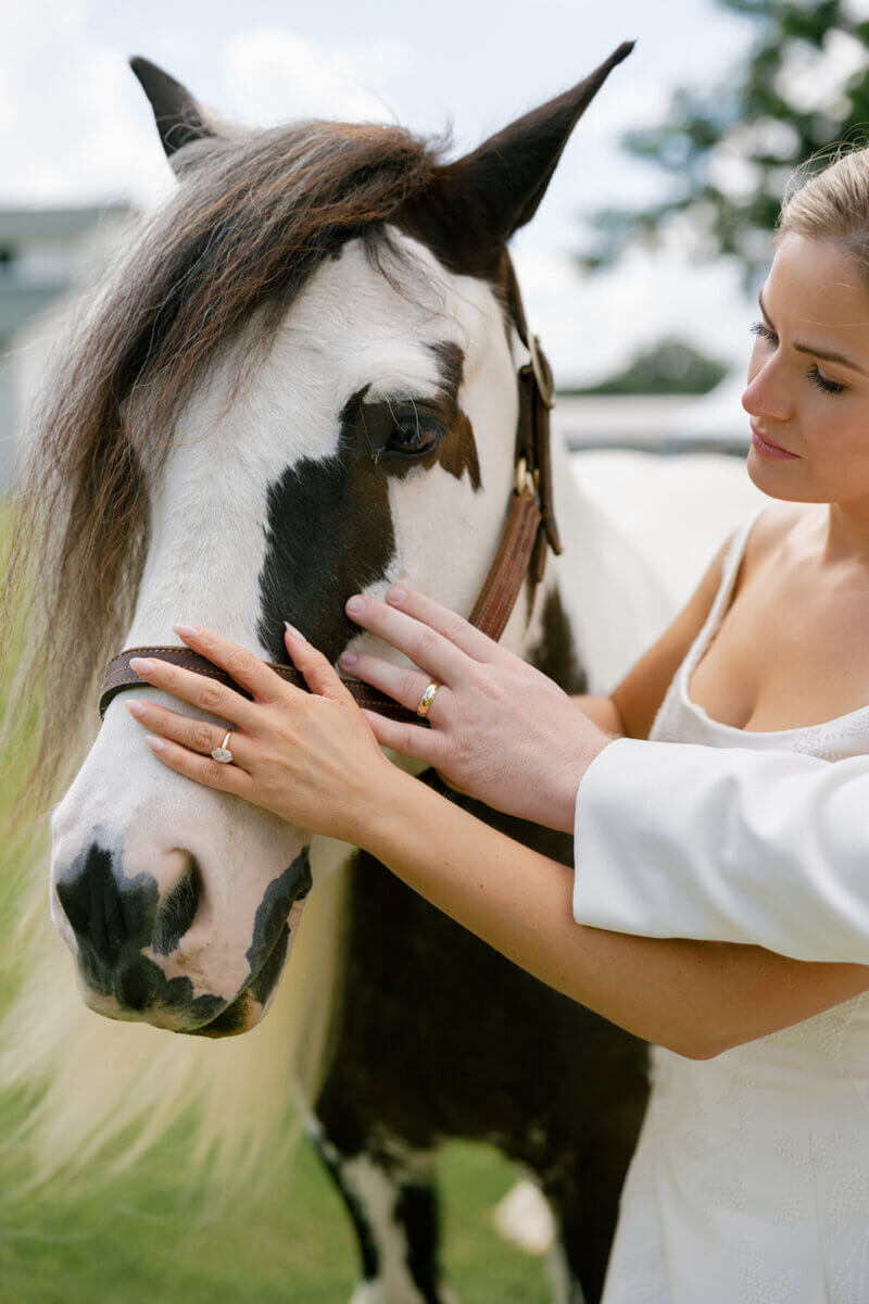 Luke custom-designed the vintage engagement ring with a modern spin — a late-1800s pale yellow old mine cushion-cut diamond set in prongs from the early 1900s, on a newly designed band. Image: Rachel Fugate Photography