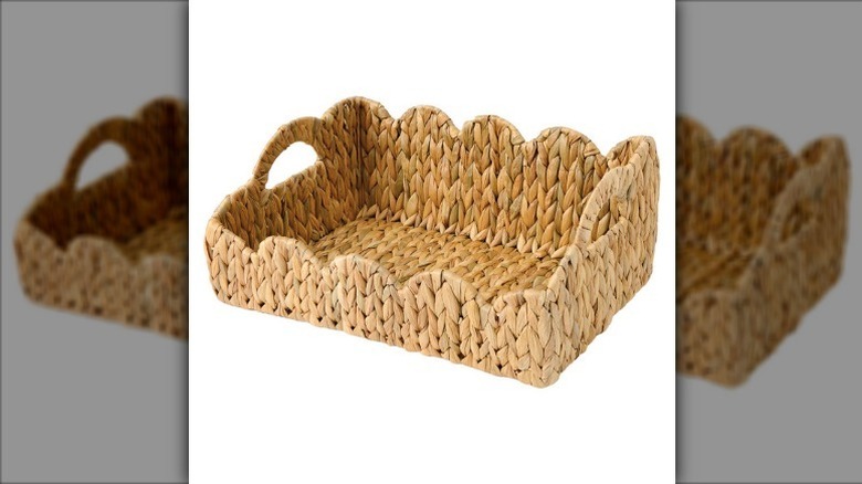 Kirkton House woven basket with scalloped edges and two handles on white background