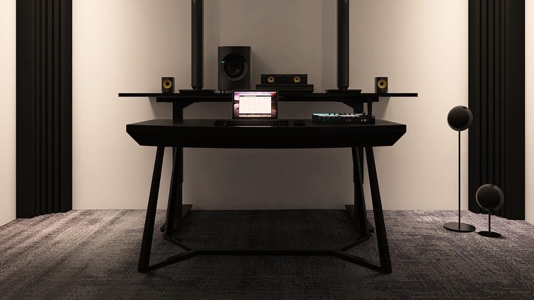 Two vertical bass traps placed in the corners of a recording studio.