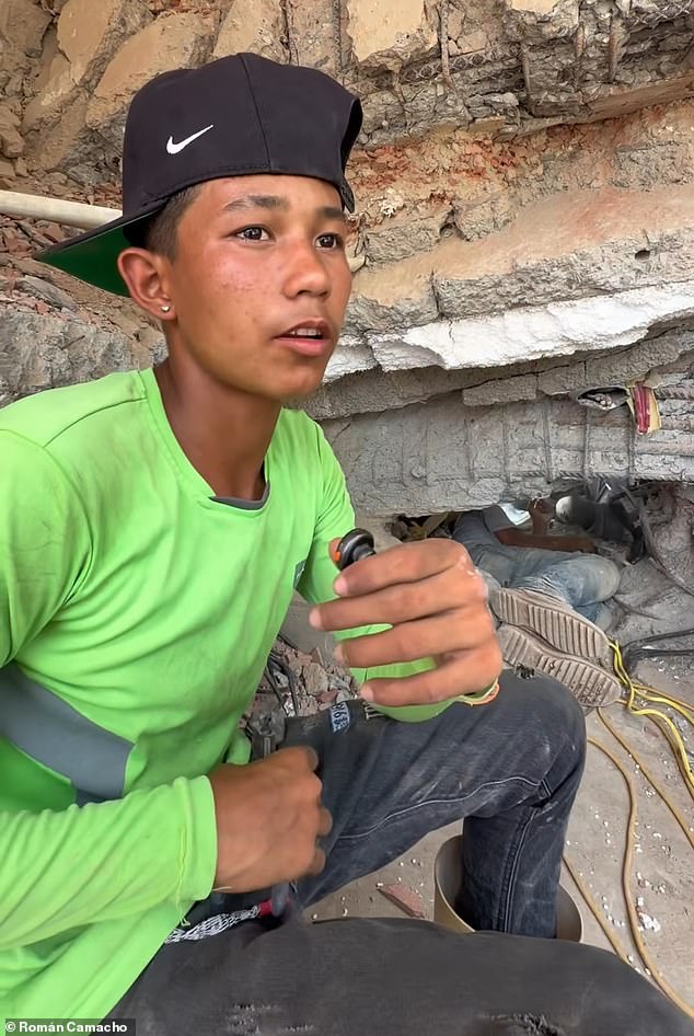 Winder Delfin (pictured), 17, and his brother, Deivi, 15, spent three weeks digging through rubble from the Venezuela earthquake to find their mother's body