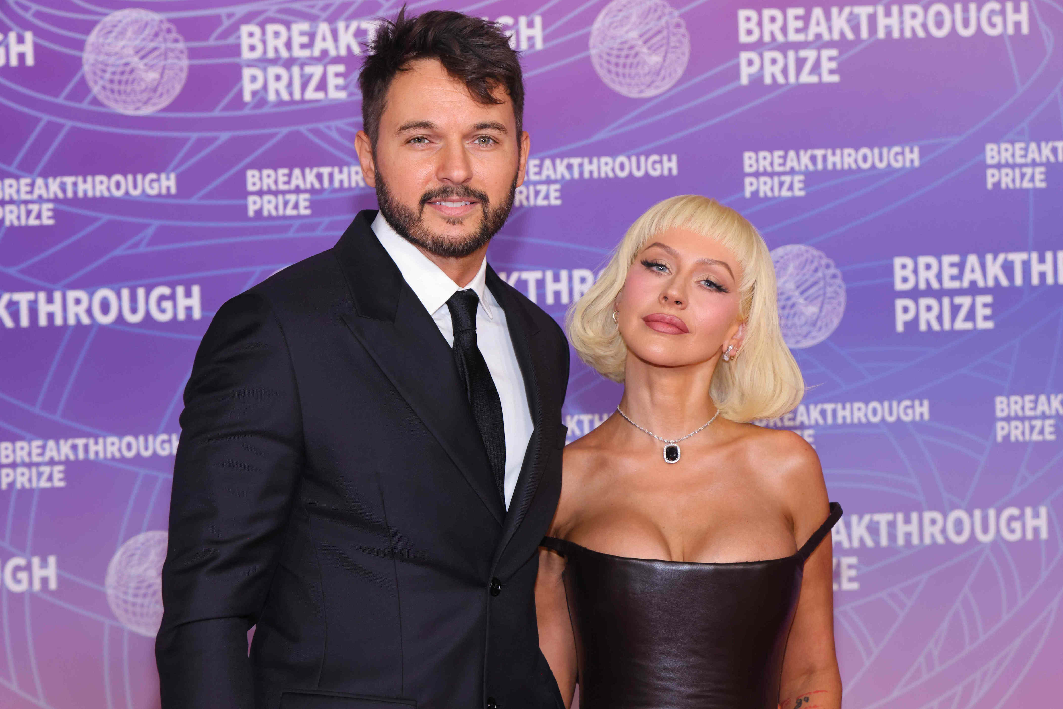Christina Aguilera and fiancé Matthew Rutler enjoy PDA-packed date night in NYC