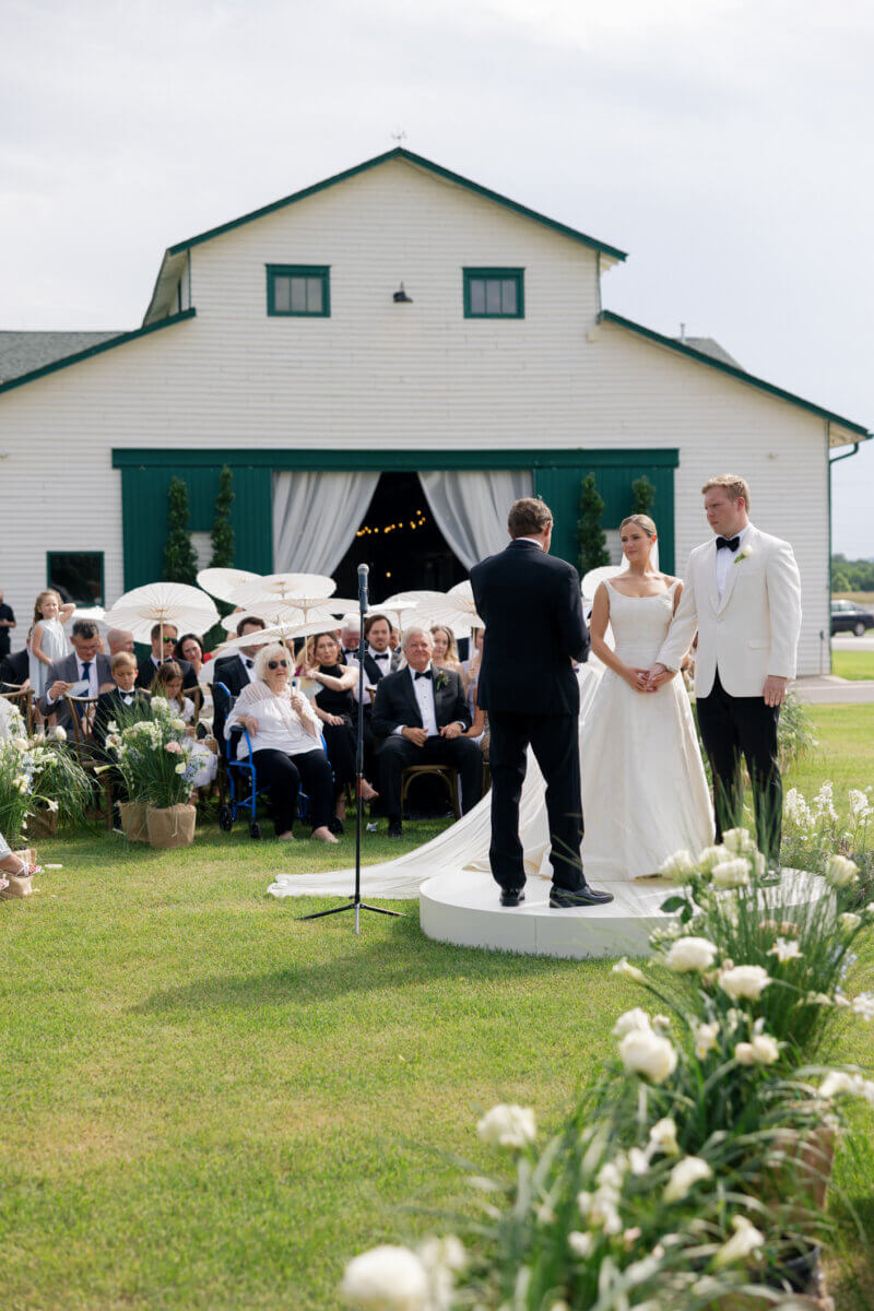 “We wanted the florals to feel organic, incorporating airy grasses and blooms with plenty of movement that complemented the surrounding landscape,” Claire says. Image: Rachel Fugate Photography