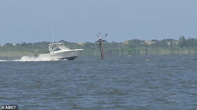 State Police said the vessel struck an Intercoastal Waterway channel marker, seen here, causing the youngsters to be thrown into the water