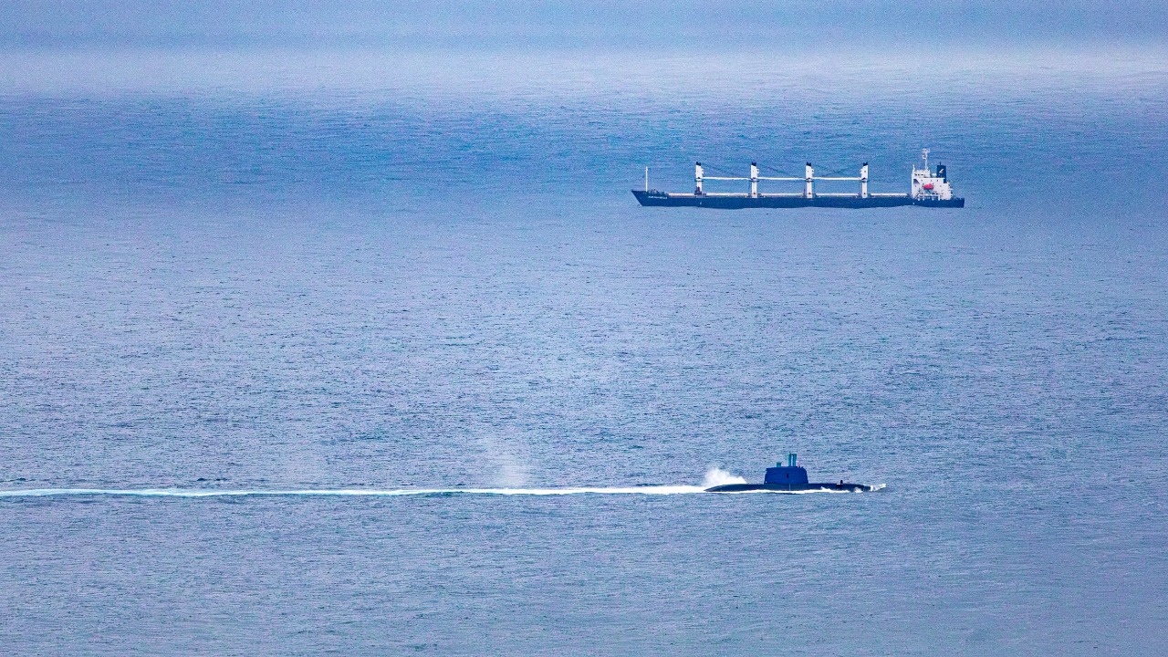 Satellite photos caught China floating a strange, sail-less submarine