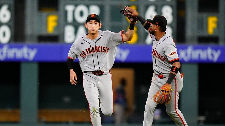 San Francisco Giants right fielder Jung Hoo Lee (51) celebrates with second baseman Luis Arraez. Mandatory Credit: Ron Chenoy